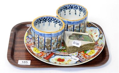 Lot 185 - A pair of Oriental blue and white lobed cache pots, a decorative plate and an interior...