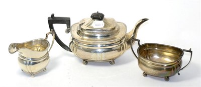 Lot 196 - A George V silver three piece teaset, by Thomas Edward Atkins, Birmingham, 1912, of squat...