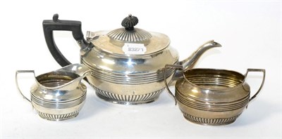 Lot 198 - A late Victorian silver three piece silver bachelor's teaset, by Henry Stratford, Sheffield,...