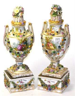 Lot 223 - Pair of Carl Thieme, Potschappel porcelain twin-handled vases, covers and stands, circa 1900,...