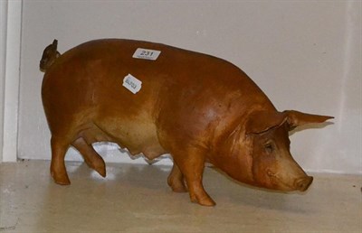 Lot 231 - A pottery model of a pig by Nichola Theakston (a.f.)