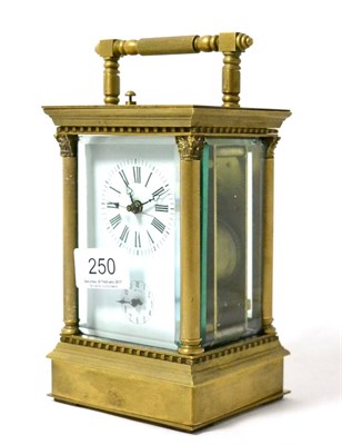 Lot 250 - A reproduction brass striking and repeating alarm centre seconds carriage clock