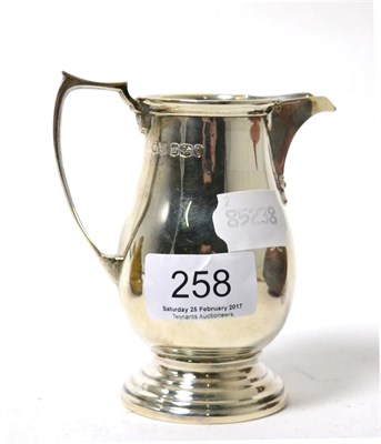 Lot 258 - A Mappin & Webb silver cream jug