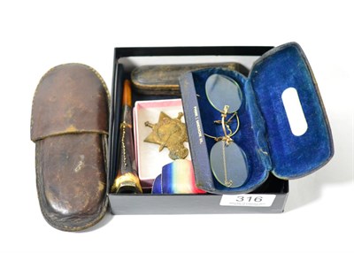 Lot 316 - A WWI medal presented to Hustwayte, cheroot holders, cased pipe, spectacles etc