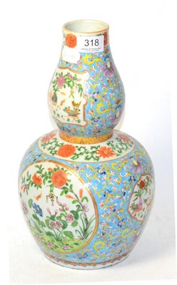 Lot 318 - A Chinese double gourd vase with floral decoration