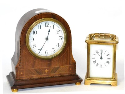 Lot 324 - An inlaid mantel timepiece and a brass carriage timepiece (2)