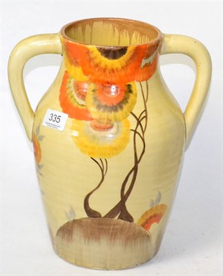 Lot 335 - A Clarice Cliff twin handled lotus jug (cracked)