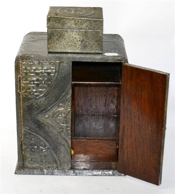 Lot 347 - An Arts & Crafts hammered pewter smokers cabinet, together with a small trinket box