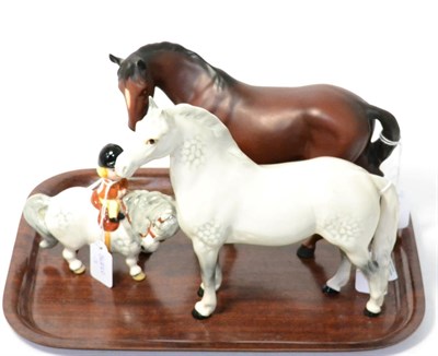 Lot 357 - A Norman Thelwell for Beswick figure of a girl on a pony, together with two Beswick horses