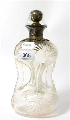 Lot 365 - A late Victorian Scottish pinch-waisted glass decanter with stopper and ornate silver mounts,...