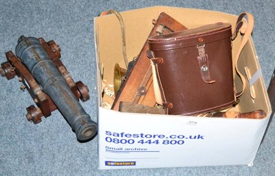 Lot 374 - Two signal canons, two Sudanese knives, two daggers, a pair of binoculars and a bugle