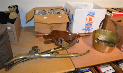 Lot 1071 - Quantity of pewter, brass ware, oil lamps, bellows, copper horn, pair of horse hames etc