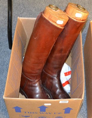 Lot 1080 - A pair of vintage brown riding boots with trees, boot pulls etc