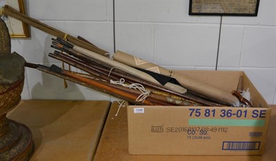 Lot 1096 - A collection of silver mounted and other walking canes and parasols, etc