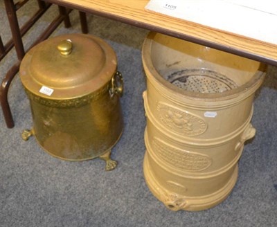 Lot 1103 - A Victorian stoneware water filter and a brass coal bucket of similar date