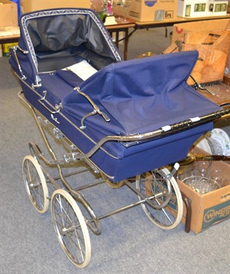 Lot 1109 - A silver cross pram