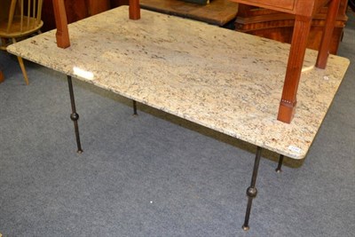 Lot 1130 - A marble topped metal dining table