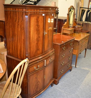 Lot 1142 - A reproduction cocktail cabinet together with a reproduction TV stand and an Edwardian inlaid...