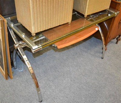 Lot 1149 - A modern chrome framed glass topped computer table