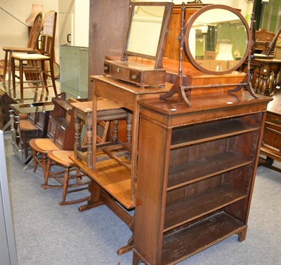 Lot 1155 - A quantity of furniture to include dwarf bookcase, four chairs, two toilet mirrors, hanging...