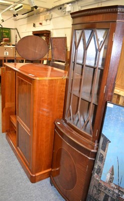 Lot 1156 - A corner cupboard and a TV cabinet