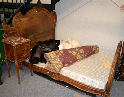 Lot 1163 - A French Kingwood double bedstead and a similar marbled top bedside cabinet (2)