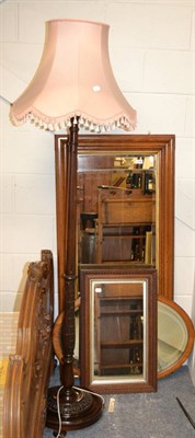 Lot 1164 - Three oak framed mirrors and a standard lamp