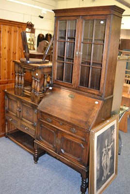 Lot 1172 - A three legged stool, a bureau, a chest, a nest of three tables, a bedside table and a pine...