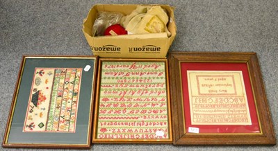 Lot 1217 - Two framed alphabet samplers, worked in coloured wools, dated 1874 and 1875; another worked in...