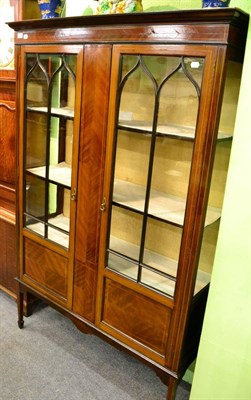 Lot 1226 - An Edwardian inlaid mahogany display cabinet