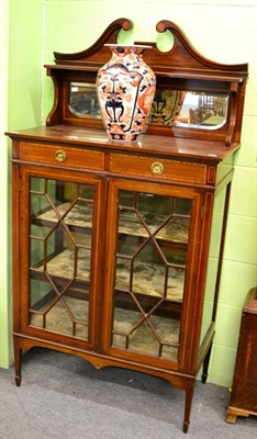 Lot 1230 - An Edwardian inlaid mahogany display cabinet with mirrored superstructure