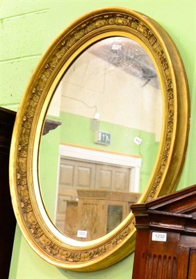 Lot 1233 - Victorian oval gilt mirror