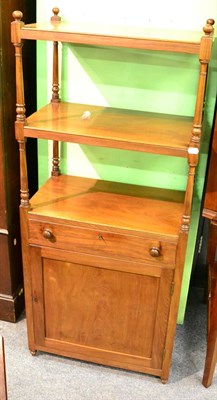 Lot 1234 - A 19th century mahogany two tier whatnot fitted with a base cupboard