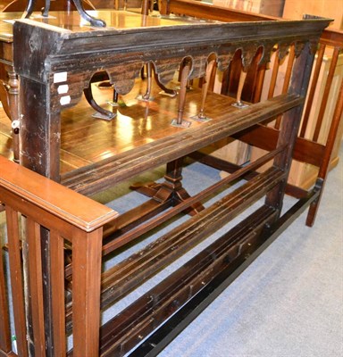 Lot 1242 - A Georgian oak plate rack