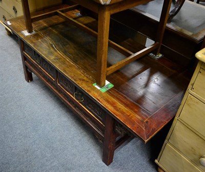 Lot 1255 - A large Chinese coffee table fitted with base drawers