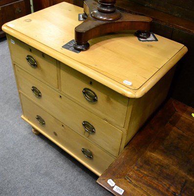 Lot 1256 - A pine three height chest of drawers