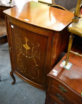 Lot 1271 - An inlaid mahogany music cabinet