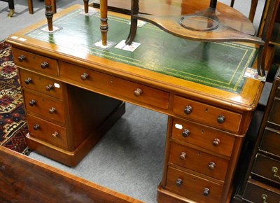 Lot 1281 - A Victorian desk with leather inlaid top