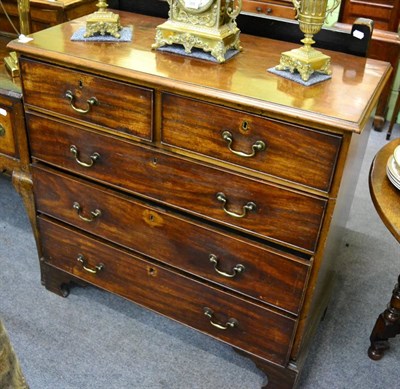 Lot 1294 - A George III mahogany five drawer chest