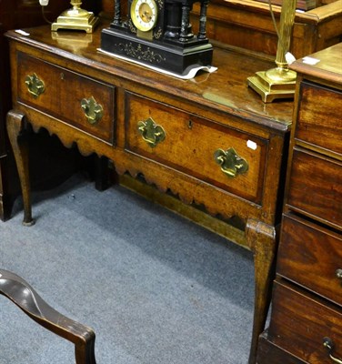 Lot 1295 - An 18th century oak two drawer dresser base