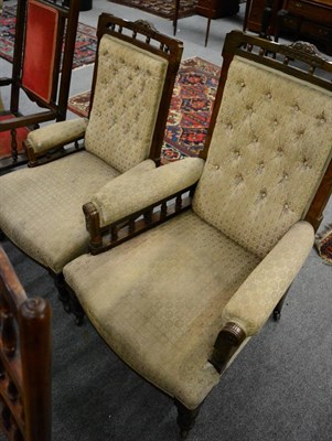 Lot 1297 - A pair of late Victorian upholstered armchairs