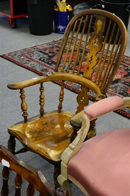 Lot 1299 - A 19th century windsor armchair with out scrolled arms