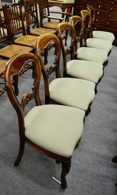 Lot 1301 - A set of six Victorian mahogany balloon back chairs