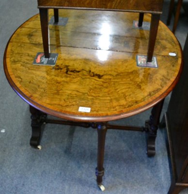 Lot 1326 - A Victorian cross-banded walnut Sutherland table