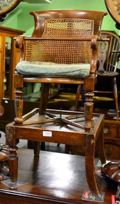 Lot 1329 - A 19th century child's high chair on stand