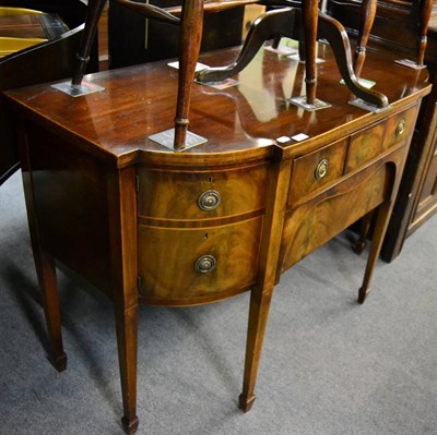 Lot 1335 - A George III-style mahogany bow front, break front sideboard&nbsp