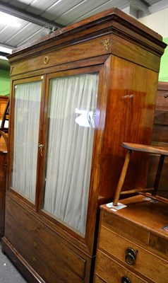 Lot 1345 - A French glazed wardrobe fitted with base drawers