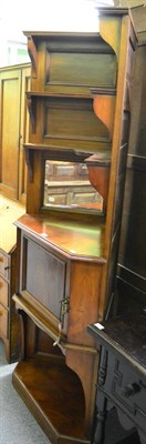 Lot 1350 - An American walnut corner cupboard