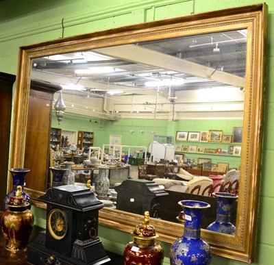 Lot 1375 - A large gilt framed rectangular mirror