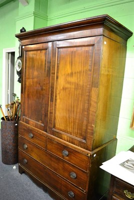 Lot 1377 - A George III mahogany linen press